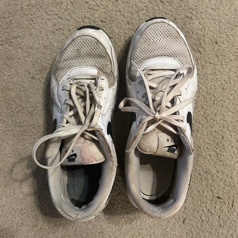 very worn women’s workout/sports sneakers